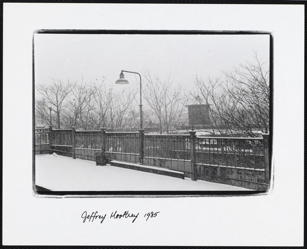 Snow covered station platform and lamp