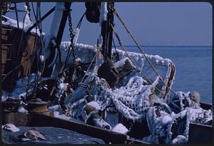 Snow-covered equipment on a boat