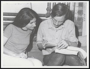 Draft Resisters looking over Telephone Books Deborah De Mirza + Fred Bird