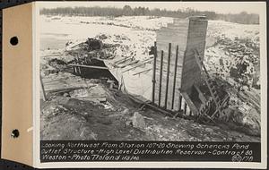 Contract No. 80, High Level Distribution Reservoir, Weston, looking northwest from Sta. 107+20 showing Schenck's Pond outlet structure, high level distribution reservoir, Weston, Mass., Jan. 5, 1940