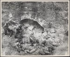 Marines on Guam, advancing along the Agat Road towards Orote Peninsula, found many pillboxes and dugouts