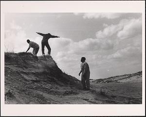 Playing on the dunes during a field trip