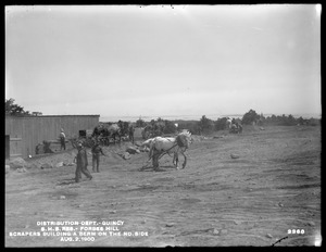 Distribution Department, Southern High Service Forbes Hill Reservoir, scrapers building a berm on the north side, Quincy, Mass., Aug. 2, 1900
