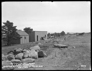 Distribution Department, Southern High Service Forbes Hill Reservoir, scrapers building a berm on the north side, Quincy, Mass., Aug. 2, 1900