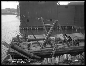 Distribution Department, Low Service Pipe Lines, scow laying 24-inch pipe, Chelsea Creek; Chelsea; East Boston, Mass., Sep. 14, 1900