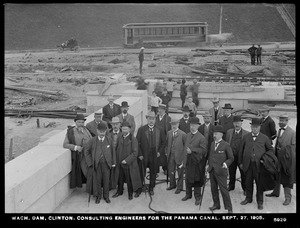 Wachusett Dam, Consulting Engineers for the Panama Canal; members of the International Board of Consulting Engineers; the Isthmian Canal Commission; the Metropolitan Water & Sewerage Board; and the Engineers of the Metropolitan Water & Sewerage Board, Water Works, abutment, looking towards Boylston Street, with car and horse-drawn railway on street, Clinton, Mass., Sep. 27, 1905