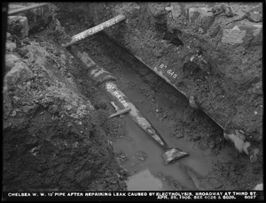 Electrolysis, Chelsea Water Works, Broadway at Third Street, 10-inch pipe after repairing leak caused by electrolysis (compare with Nos. 6026 and 6028), Chelsea, Mass., Apr. 26, 1906