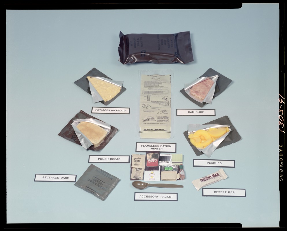 Food lab, flameless ration heater with ham slice, peaches, potatoes, desert bar, accessory packet