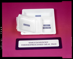 Simultaneously thermoprocessed meal tray