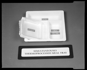 Simultaneously thermoprocessed meal tray