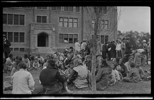 People gathered outside of College building