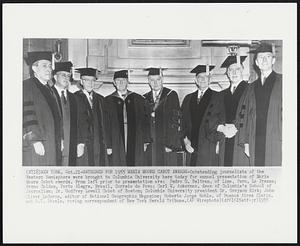 Gathered for 1955 Maria Moors Cabot Awards-Outstanding journalists of the Western Hemisphere were bought to Columbia University here today for annual presentation of Maria Moors Cabot awards. From left prior to presentation are: Pedro G. Beltran, of Lima, Peru, La Prensa; Breno Caldas, Porto Alegre, Brazil, Correio do Povo; Carl W. Ackerman, dean of Columbia's School of Journalism; Dr. Godfrey Lowell Cabot of Boston; Columbia University president Dr. Grayson Kirk; John Oliver LaGorce, editor of National Geographic Magazine; Roberto Jorge Noble, of Buenos Aires Clarin, and A.T. Steele, roving correspondent of New York Herald Tribune.