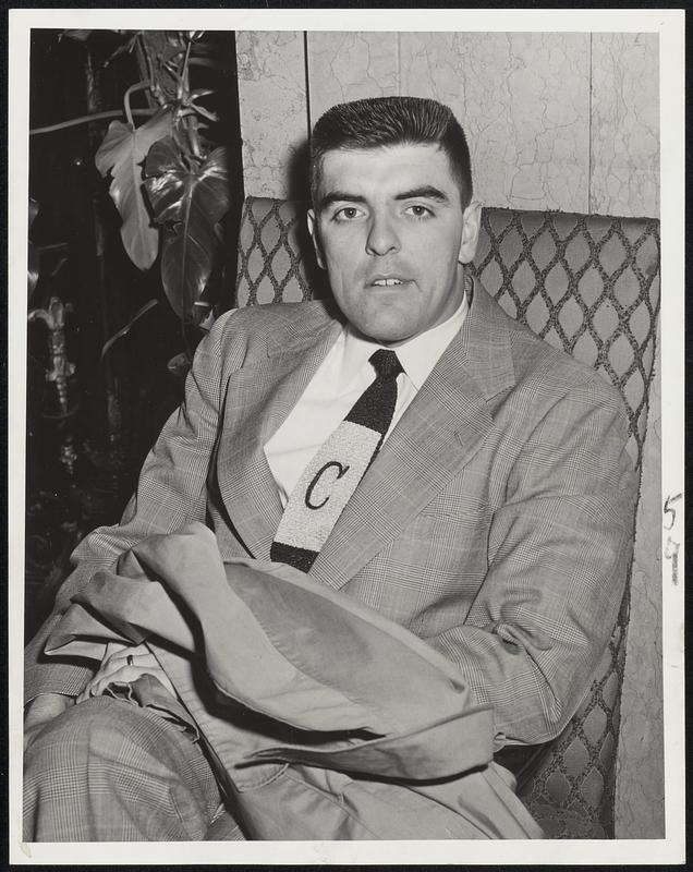 Civilian Simmons, which means trouble for the Braves. Curt Simmons, bonus baby, is back with the Phillies after a hitch in the army. Here he takes a breather in the Hotel Kenmore today as the Braves-Phils game was rained out. Curt may pitch against the Tribe Sunday.