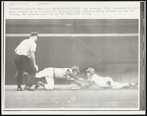 Reds vs. Dodgers-Cincinnati: Los Angeles' Bill Grabarkewitz wins what appears to be a stand-off at second base during a steal attempt in the 7th inning. The Dodgers won 9 to 3.