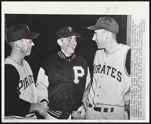 Sets Down Dodgers With Three Hits -- Righthander Ronnie Kline (center) of the Pittsburgh Pirates is congratulated by teammates Bill Virdon (left) and Bob Skinner after he set down the Dodgers with one run and three hits here last night. Pittsburgh won, 3-1. Virdon made three of the Pirate hits.