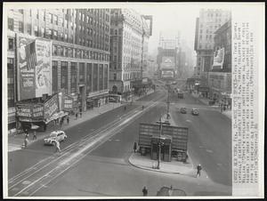 New York -- Wide Open Spaces -- This is Times Square, virtually deserted shortly before 9 a.m. today, following Mayor William O'Dwyer proclamation shutting down all places of public assembly in order to cope with a critical fuel shortage resulting from the nine-day old tug boat strike.