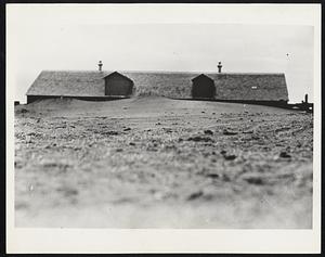 Five Years Ago This Week Partly enveloped by drifting sand is this abandoned farmhouse at Dallas, in one of the areas stricken by the unprecedented drought which brought with it soil erosion and dust storms. On August 6 President Roosevelt entered the Dakota drought region and on the following day, after a tour of the area, pledged himself to bend every effort toward a solution of the problem.