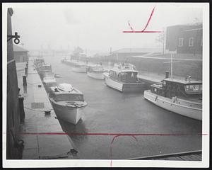 Seeking Shelter yachtsmen tied their expensive vessels in the protected canal of the Charles River Basin Dam. Hundreds of similar yachts were destroyed.