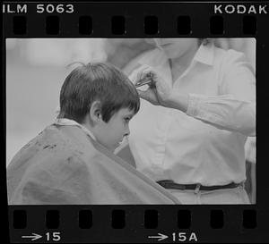 Boy getting his hair cut at Inn Street Barbers