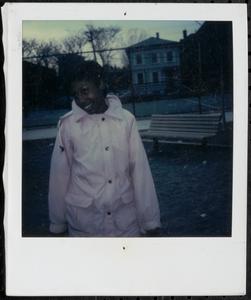 Young woman wearing a pink jacket