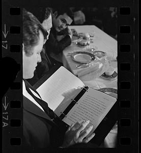 Ted Kennedy prepares to make speech, reading text, Boston