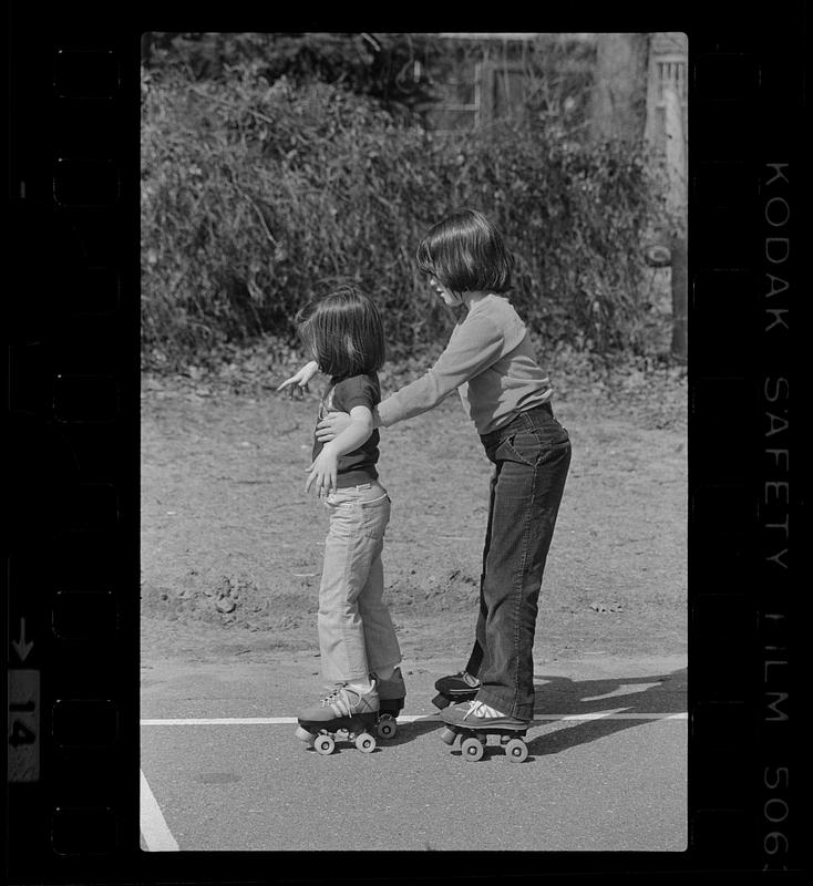 Suzanne Daley has a skating lesson from sister Amy, Needham