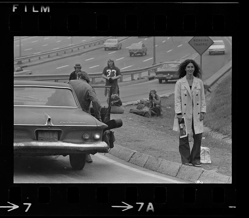 Hitchhikers seek rides on Mass. Pike at Massachusetts Ave., Boston