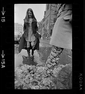 Maxi coat and winter slush in Copley Square, Boston