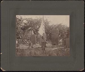 Photograph of Deborah Sampson's gravestone with a flag flying by the gravestone, Rock Ridge Cemetery