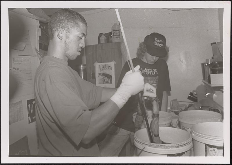 Dennis in art class making tie-dye shirts