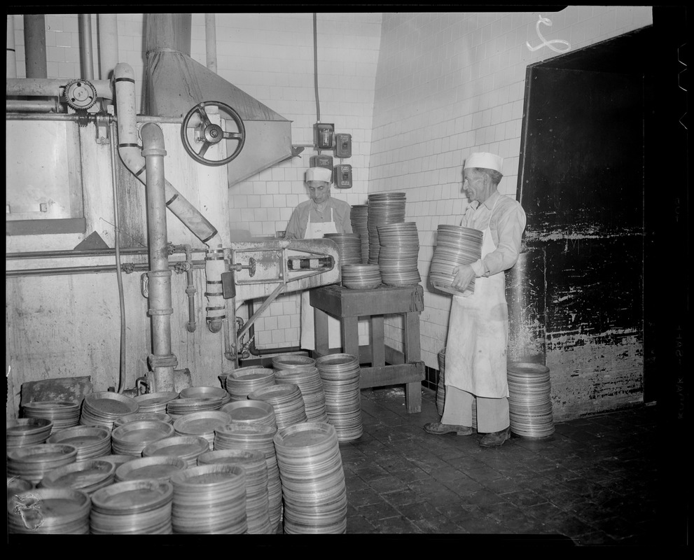 Jimmy Karis and Cota Betsu sterilizing plates, Table Talk factory, Worcester