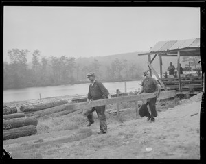 Men sharpen saw at lumber mill in West Rutland