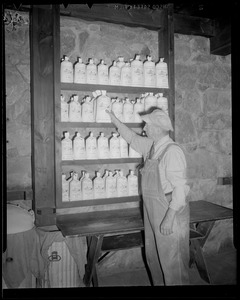 Miller with flour, Henry Ford Grist Mill, Sudbury