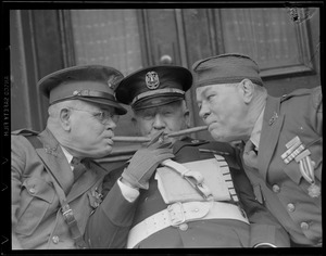 Military men smoking cigars