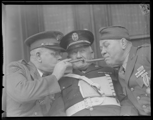 Men in uniform smoking cigars