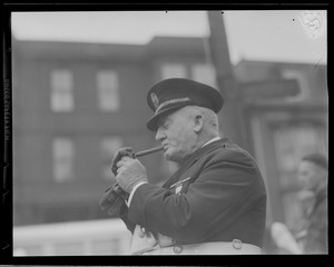 Men in uniform smoking cigars