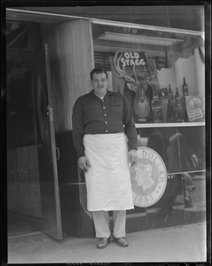 Bartender outside establishment