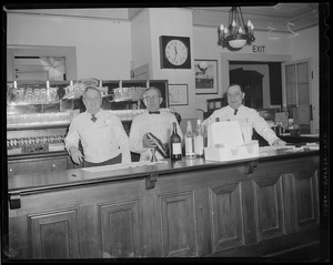 Three bartenders