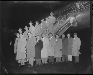 Group of men at airport