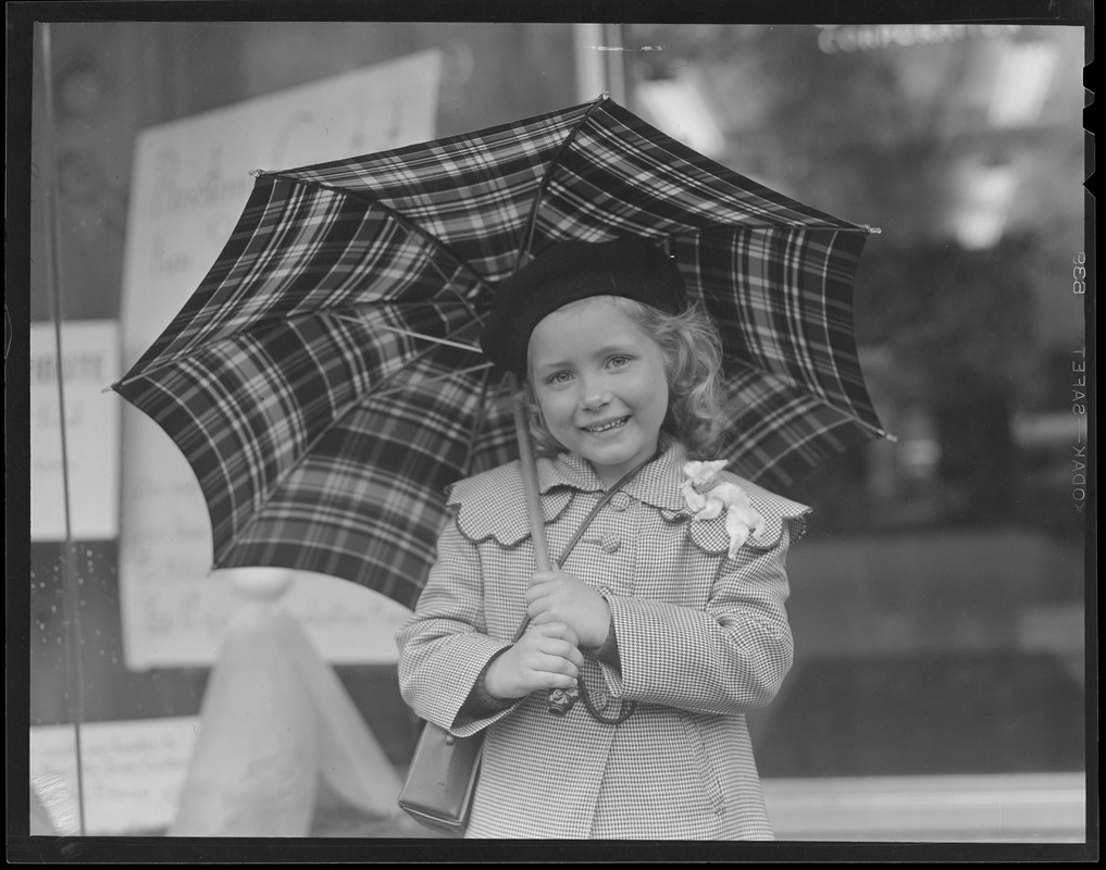 Little girl with umbrella