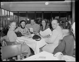 Group dining in rooftop restaurant