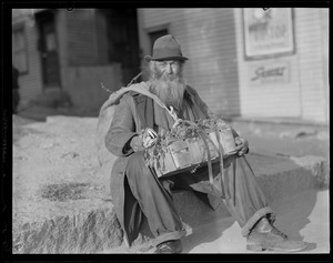 Unidentified man with basket