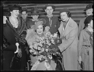 Woman in wheelchair receives flowers