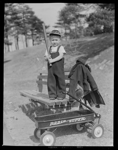Boy with baseball bat & radio flyer