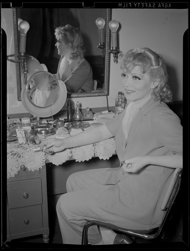 Woman at makeup table