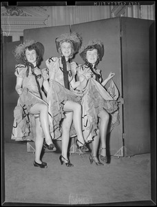 Three unidentified women in costume