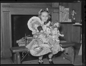 Girl with dolls