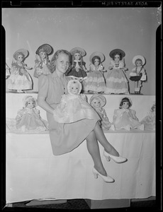 Woman with dolls