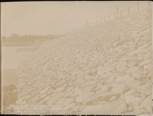 Sudbury Reservoir, Section D, riprap on the southerly side of the Willow Bridge Road, from the east at the foot of slope, Southborough, Mass., May 4, 1897