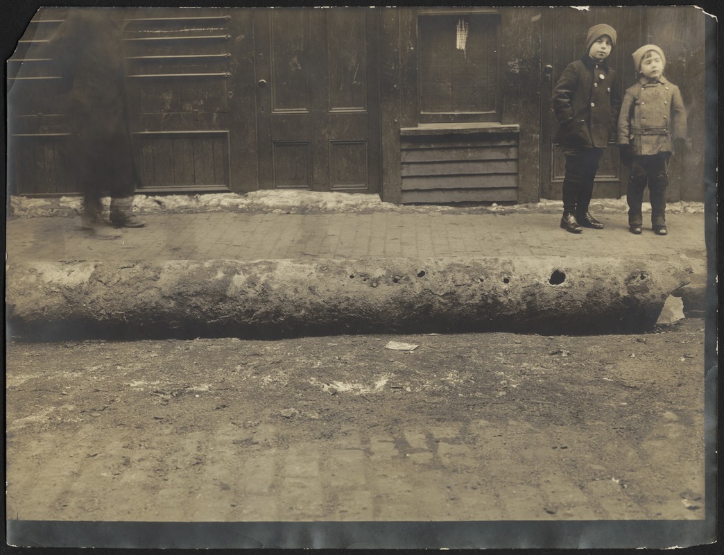 Electrolysis, Boston Water Works, Dover Street at east side of Washington Street, 12-inch pipe after removal from trench showing electrolytic pittings, Boston, Mass., Dec. 16, 1905